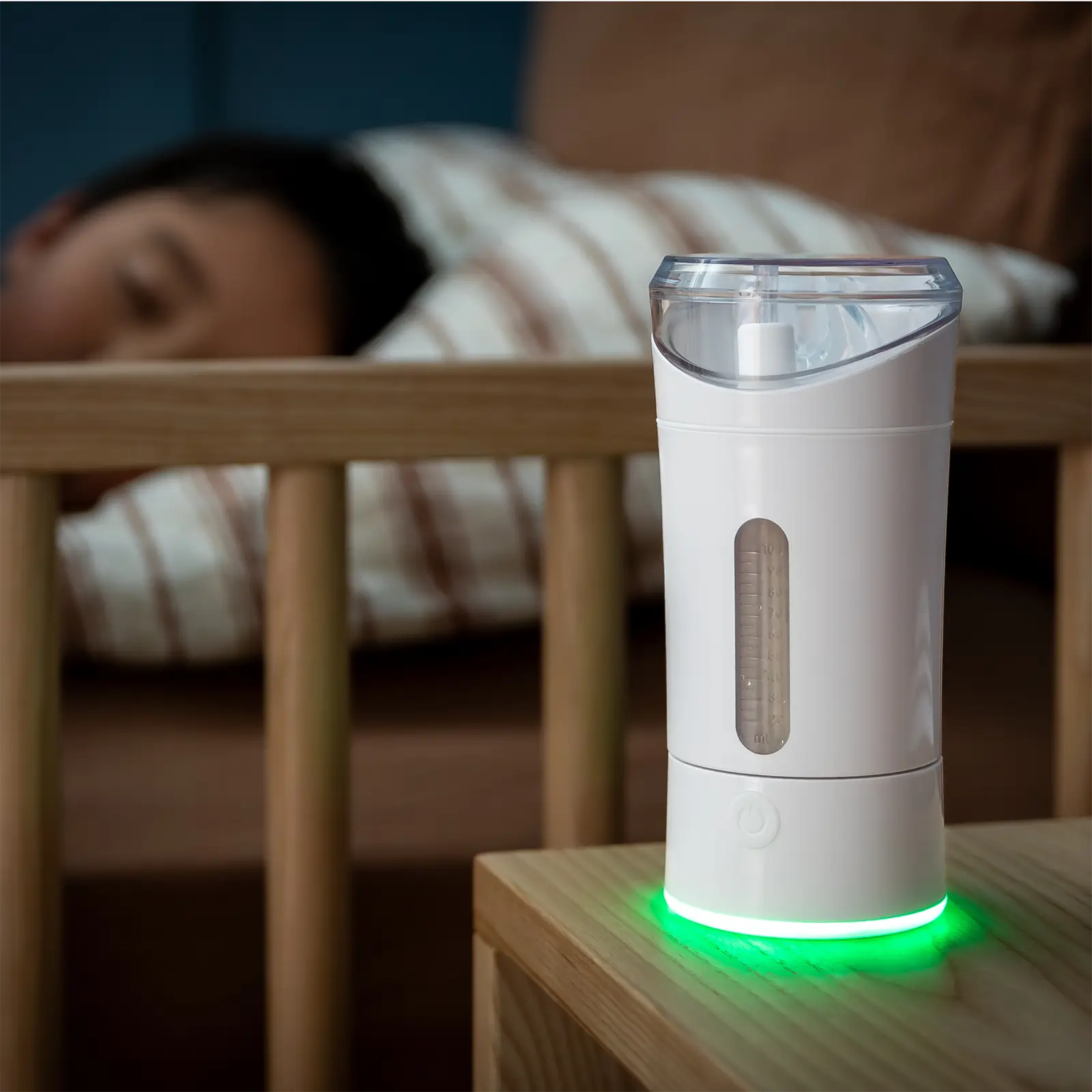 Earflo device charging on nightstand